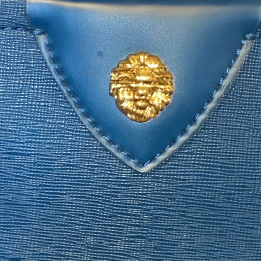 This beautiful Anne Klein shoulder bag perfect color for fall season